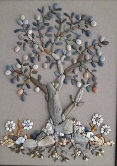 a tree made out of rocks and shells