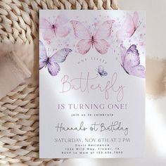 a pink and purple butterfly birthday party with watercolor butterflies on it's back