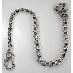 "925 Sterling Silver Chain Silver Weight: Approx. 212g Chain Length : 23\" Inches (58.42 cm.) 15 mm. Chain Link Width Gothic Detail Clasp This substantial and collectible piece is made from a super solid Sterling Silver that is unbelievably weighty and is without doubt this piece one of our most robust and chunky pieces. The Gothic wallet chain is highly polished for the ultimate shine factor and measures 23\" inches in length making it suitable for pockets, bags, wallets and many others. Simply Gothic Wallet, Silver Wallet, Biker Chain, Biker Wallet, The Gothic, Men's Wallet, 925 Sterling Silver Chain, Wallet Chain, Chain Lengths