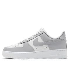 The Nike Air Force 1 07 'Light Smoke Grey White' is a timeless classic. This sleek silhouette features a full leather base with a mesh tongue and lining. The solid white AF1 rubber sole completes the minimalist design. With its versatile colorway, this sneaker is perfect for any occasion. The Air Force 1 series was inspired by the world of aviation and has been a staple of streetwear since 1982. This timeless design is sure to turn heads and make a statement. (AF1/SNKR/Skate/Low Top/Classic/Non-Slip/Wear-resistant) Nike Air Force 1 Grise, Classic Nike Air Force 1 High-top Leather, Classic High-top Leather Nike Air Force 1, Classic Leather High-top Nike Air Force 1, Classic Nike Air Force 1 Low-top, White Leather Nike Air Force 1 With Perforations, Nike Air Force 1 Leather With Perforations, White Nike Air Force 1 Leather Classic Style, Classic Nike Air Force 1 With White Sole