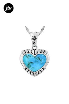 Indulge in the exquisite allure of our 16x12mm Blue Composite Turquoise Sterling Silver Heart Enhancer Pendant With Chain by Southwest Style by JTV���. Crafted with impeccable detail, this pendant boasts a captivating motif and vibrant turquoise hues that effortlessly elevate any ensemble. The composite turquoise features bound pieces intricately assembled to create a stunning visual effect.  Measuring at 1.16 inches in length and 0.82 inches in width, this accessory is designed to make a statem Spiritual Blue Jewelry With Heart Charm, Blue Spiritual Heart Pendant Jewelry, Spiritual Blue Heart Pendant Jewelry, Turquoise Jewelry With Heart Charm For Anniversary, Heart-shaped Turquoise Necklace As Gift, Turquoise Heart Charm Jewelry For Anniversary, Turquoise Heart Pendant Necklace, Elegant Turquoise Jewelry With Heart Beads, Elegant Turquoise Heart Beads Jewelry