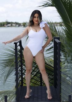 Description: White one-piece swimsuit with a U-shaped back neckline. With a one-shoulder neckline bolero. Comfortable moderate coverage. Color may vary due to lighting on images. The product images (without model) are the closest to the true color of the product. Runs true to size. 𝑺𝒊𝒛𝒆 𝑪𝒉𝒂𝒓𝒕: • 2-4 Small • 6-8 Medium • 10-12 Large 𝑺𝒉𝒊𝒑𝒑𝒊𝒏��𝒈 • This Item ships for free. 𝑹𝒆𝒕𝒖𝒕𝒏𝒔 • Returns (For store credit only) accepted within 30 days after your package has been delivered. White One Piece, Product Images, True Colors, Bathing Suit, One Piece Swimsuit, Bathing Suits, One Shoulder, Shoulder Strap, Size Chart