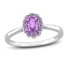 Embark on your forever journey together with this beautiful gemstone and promise ring. An exquisite oval-cut amethyst is simply radiant when embraced by a colorful halo of round-cut amethysts. The floral-inspired silhouette is fashioned in stylish sterling silver. Delicate Rings, Faceted Gemstones, Amethyst Gemstone, Watch Necklace, White Ring, Sterling Ring, Promise Rings, Jewelry Sales, Women Rings