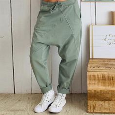 Specifications Material: Cotton Length: Ankle-Length Pants Pant Style: Cross-pants Fit Type: Loose Decoration: Pockets Fabric Type: Broadcloth Closure Type: Drawstring Waist Type: MID Size Chart Size Waist Hip Length S 25.9in / 66cm 108 cm 39.7in / 101cm M 27.5in / 70cm 44.4in / 113cm 40.1in / 102cm L 29.1in / 74cm 46.4in / 118cm 40.9in / 104cm XL 30.7in / 78cm 48.4in / 123cm 41.3in / 105cm 2XL 32.2in / 82cm 50.3in / 128cm 42.1in / 107cm 3XL 33.8in / 86cm 52.3in / 133cm 108 cm 4XL 35.4in / 90cm Plus Size Harem Pants, Overalls Plus Size, Celana Fashion, Harem Trousers, Drop Crotch Pants, Pockets Pants, Boho Pants, Long Trousers, Plus Size Pants