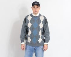 "Vintage 80s men's pullover sweater in gray with a front diamond pattern - materials: no label SIZE label: no label best fits men: L/XL MEASUREMENTS chest: 52 inches (132 cm) length: 27 inches (69 cm) sleeve length from armpit: 20,5 inches (52 cm) The model is 6'1\" (186 cm), measures 41-35-39 (104-88-100 cm) CONDITION (1-10) - 8 - the sweater in good vintage condition This garment has been laundered and is ready to use. When preparing clothes for sale, we try to remove all possible defects, and Retro Crew Neck Sweater With Argyle Pattern, Retro Crew Neck Argyle Sweater, Retro Argyle Pattern Crew Neck Sweater, Preppy Pullover, Mens Pullover Sweater, Gray Diamond, Mens Pullover, Pullover Sweater Men, 80s Mens