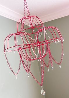 a pink chandelier hanging from the ceiling