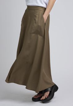 Sizes: XS/S and S/M Color: Brown60% Linen 40% RayonLinedSide PocketsMidi LengthSlit Down The MiddleDry CleanBy The NKC Store XS/SWaist: 71.12cm / 28in Length: 85.09cm / 33.50in Model is 172cm / 5'8" wearing Size XS/S Spring Workwear Skirt With Side Slits, Fitted Midi Maxi Skirt With Pockets, Relaxed Maxi Skirt With Side Slits, Spring Full-length Skirt With Side Pockets, Spring Full Length Skirt With Side Pockets, Full Length Skirt With Side Pockets For Spring, Full-length Relaxed Skirt With Pockets, Full-length Skirt With Pockets, Relaxed Full-length Skirt With Pockets