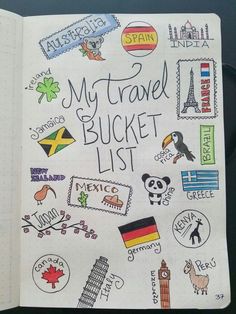 an open notebook with lots of travel stickers on it and the words, my travel bucket list