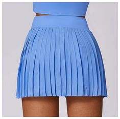 High Waisted Pleated Tennis Skirt High Compression Pleated Tennis Skirt Airlift Performance Elastic Waistband Built In Shorts Underneath & Pocket For Convenience Mini Skirt Length, Extremely Flattering Perfect For Sports, Tennis, Yoga, Pilates, Etc... Extremely Flattering & Comfortable Model is wearing a size small Material: 82% Polyester/18% Elastane Size Chart (US Sizing) Small: Size 2-4 Medium: Size 6-8 Large: Size 8-10 XL: Size 10-12 Size Chart (UK Sizing) Small: UK 6-8 Medium: UK 10-12 Larg Blue Mini Skirt For Summer, Summer Purple Pleated Bottoms, Summer Pleated Purple Bottoms, Fitted Purple Tennis Skirt For Summer, Summer Fitted Purple Pleated Skirt, Purple Pleated Tennis Skirt For Summer, Summer Purple Lined Tennis Skirt, Sports Tennis, Pleated Tennis Skirt