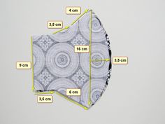 an image of a piece of fabric with measurements for the top and bottom half of it