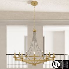 a chandelier hanging from the ceiling in a room with white walls and windows