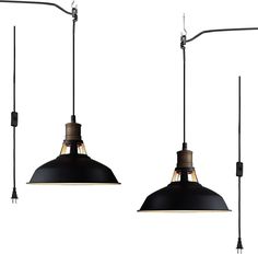 two black lamps hanging from the ceiling with one light turned on and one being turned off