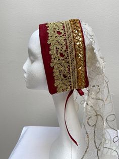 A new professional quality Renaissance Medieval Tudor Ladie's hat. This hat is a burgundy suede crown with wide gold braid trim. A cascading 21" cream sheer rose covered veil. Burgundy ribbon tie holds this regal cap in place. New not worn. Crown is 18 1/2" by 4" wide. A great item for your next theme party, stage production or special occasion.  Sales final. Tudor Fashion, Suede Hat, Costume Hats, Fantasy Clothing, Costume Accessories, Headpiece, Pretty Outfits, Hats, Purses And Bags