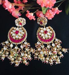 Beautiful and Unique Style Affordable Luxury traditional Bollywood Chandbali earrings with Kundan stones and Colored ruby semi precious Stones. 22k gold plated jewelry Length: 3.5 Inches Comes with push back closure Made in Brass with very high quality Kundan stones and Pearls. Lightweight Jewelry Click here to see the complete collection of Kundan and Polki Statement Earrings at AryaFashions: https://www.etsy.com/shop/AryaFashions?section_id=25872820 Follow us on social media for new and latest Luxury Bollywood Kundan Chandbalis, Luxury Traditional Chandbalis With Cutdana, Cheap Wedding Chandbalis, Luxury Kundan Chandbalis For Ceremonial Occasions, Luxury Bollywood Chandbalis With Tilla Detail, Luxury Kundan Chandbalis For Festivals, Luxury Chandbali Bridal Earrings With Latkans, Cheap Elegant Wedding Chandbalis, Affordable Kundan Bollywood Earrings