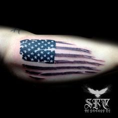 an american flag tattoo on the arm