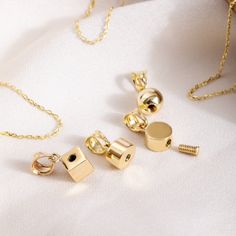 14K Yellow Gold Tiny Fillable Personalized Memorial Pendant, Cremation Jewelry for Pet or Human Ashes, Minimalist Mini Ball, Cylinder, Cube, Round Disc Medallion Cremation Urn Necklace for Loss of loved ones. SOLD AS A PENDANT You may check our chain models via the link below https://etsy.me/3EUig8k REMINDER These products are very minimal products and only a very small amount of ashes can be placed in them. Material: Real Solid Gold, real gold (not gold-filled or not gold-plated) Available Gold Cremation Necklaces, Mama Necklace, Memorial Pendant, Urn Necklace, Urn Necklaces, Human Ashes, Cremation Jewelry, Disc Pendant, Zodiac Necklaces