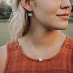 This Butterfly Necklace and Huggie Hoop Earrings Set is an enchanting blend of elegance and whimsy.  The delicate butterfly pendant gracefully dangles from a dainty chain, adding a touch of nature-inspired charm to your neckline.  Paired with the trendy huggie hoop earrings adorned with butterfly motifs, this set is a symbol of grace and beauty.  DETAILS:  🖤 14k Gold Filled or Sterling Silver Necklace and Hoop Earrings  🖤 Necklace is 18-20 inches and the bracelet is 6-8 inches  🖤 Butterfly Ch Butterfly Hoop Earrings, Necklace For Everyday, Dainty Necklace Layered, Butterfly Necklace Gold, Delicate Butterfly, Dainty Chain, Hoop Earring Sets, Earrings Dainty, Gold Butterfly