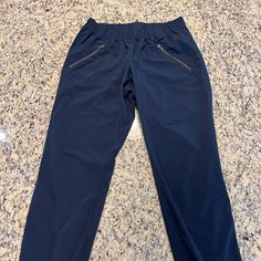 Nwot Athleta Navy Joggers With Zip Pockets. Unique Scrunching Detail Down The Sides! Beautiful Color And Soft Material. Size: 2 Stretch Sports Joggers With Pull-on Style, Navy Activewear With Elastic Waistband For Gym, Navy Activewear With Elastic Waistband For Workout, Navy Sports Pants With Elastic Waistband, Navy Activewear With Pockets For Gym, Navy Activewear With Pockets For Workout, Navy Athleisure Pants For Gym, Navy Athleisure Pants For The Gym, Navy Athleisure Pants For Sports