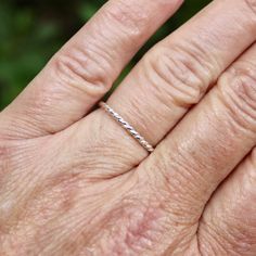 You can't get more simple than this! A classic twisted wire sterling silver stacking ring. You can wear this stacker alone or in a set of stackable rings. It also makes a great gift for a teenager or college student. Here are the details: It is made with 1.63mm (14 ga) solid sterling silver twisted wire. Each ring is handmade to order by Will Macy, in Corvallis, OR. Tiny Adjustable Classic Stackable Rings, Classic Adjustable Stackable Rings, Twisted Stackable Promise Rings, Modern Twist Stackable Adjustable Midi Rings, Adjustable Stackable Midi Rings With A Modern Twist, Modern Twist Adjustable Stackable Midi Rings, Simple Adjustable Nickel-free Stackable Rings, Simple Adjustable Hypoallergenic Stackable Rings, Classic Adjustable Sterling Silver Stackable Rings