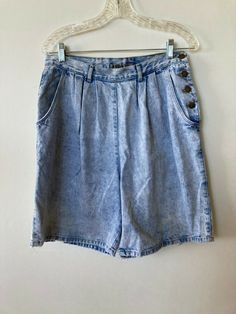 Great 80s Shorts- Bows at back leg hems. Side button closure, pleated. High rise Stone acid wash By Jordache, Made in USA Marked Sz 14 Length 21" Waist across top: 14.5" Inseam: 8" Very good condition- does have some fraying at the hems. 80s Shorts, Pretty Pins, Mom Shorts, Religious Jewelry, Acid Wash, Boho Shorts, Short Outfits, Made In Usa, Casual Shorts