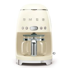 a cream colored coffee maker with the word smegle on it's side