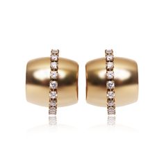 Our beautiful Serena Earrings feature a cuff hoop silhouette with a brightly polished finish, studded with sparkling round brilliant cut stones in the middle for total glamor. These little hoops sit close to the earlobes, making them the perfect finishing touch to your look, day or night. Metal Type: Stainless Steel Metal Plating: 18K Gold PlatedStone: Cubic ZirconLength: 0.78" Small Hoop Earrings With Pave Setting For Formal Occasions, Elegant Huggie Clip-on Earrings, Formal Dazzling Hoop Earrings With Single Cut Diamonds, Elegant Small Hoop Clip-on Earrings, Elegant Clip-on Huggie Earrings, Elegant Hoop Clip-on Earrings For Formal Occasions, Elegant Hoop Clip-on Earrings For Formal Events, Elegant Small Hoop Huggie Earrings For Party, Elegant Huggie Earrings For Party