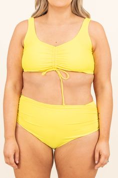 Say talk to the sand when you are wearing this amazing swim top! The yellow color is so chic and the ruching detail has an adjustable tie so you can wear this however you like! Style this cutie with the matching bottoms for a super chic pool look! 82% Polyamide, 18% Elasthane Yellow Drawstring Swimwear For Summer, Ruched Tankini With Tie-side Bottom For Vacation, Ruched Tie-side Bottom Tankini For Beach Season, Ruched Tankini With Tie-side Bottom For Beach Season, Ruched Tie-side Swimwear For Pool, Ruched Tie-side Swimwear For Spring, Ruched Tie-side Bottom Swimwear For Spring, Yellow Ruched Swimwear For Beach, Ruched Tie-side Bottom Swimwear For Pool