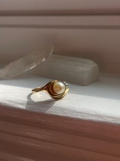 Vintage 14K Gold Diamond Pearl Ring - Etsy Vintage White Rings With Polished Finish, Vintage Rings With Polished Finish For Promise, Vintage 14k Gold Dome Ring As Gift, Retro Rings With Polished Finish For Formal Occasions, Retro Polished Rings For Formal Events, Gold Round Bypass Ring For Formal Occasions, Vintage Formal Dome Ring, Vintage Gold Dome Ring With Round Band, Gold Vintage Dome Ring With Round Band