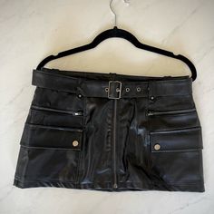 Never Worn. Live Out Your Y2k Dream In This Iconic Faux Leather Cargo Skirt. With Its Cool Cargo-Style Pockets, And Faux Leather Fabric, It's The Go-2 Skirt In Every It Girl's Closet. * Mini Skirt * Imported * Belt Detail * Utility Style Pockets Vintage Mini Skirts, 60s Fashion Vintage, Cargo Mini Skirt, Black Leather Skirt, Mini Skirt Black, Utility Style, Girl Closet, Black Leather Skirts, Cargo Style