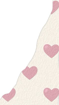 a white and pink giraffe with hearts on it's back