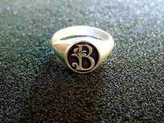 Beautiful personalised Monogram Signet Ring. It is made completely out of Sterling Silver (aka Silver 925 each piece is stamped)... Luxury Hallmarked Sterling Silver Signet Ring, Luxury Silver Ceremonial Signet Ring, Silver Engraved Initials Ring, Silver Engraved Ring With Initials For Wedding, Silver Engraved Ring With Initials, Silver Engraved Wedding Ring With Initials, Silver Wedding Ring With Engraved Initials, Silver Engraved Monogram Ring As Gift, Silver Engraved Ring With Initials For Promise