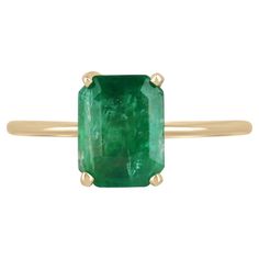 2.10cts 4 Prong Emerald Solitaire Ring 14K Gold - Natural Real 2ct Emerald Ring Displayed is a custom emerald solitaire ring in 14K yellow gold. This classic ring carries a 2.10-carat emerald in a four-prong setting. The emerald has very good clarity with minor flaws that are normal in all genuine emeralds. The gem has a beautiful green color and very good luster. An ideal solitaire, perfect for everyday use! Setting Style: Prong Setting Material: 14K Yellow Gold Main Stone: Emerald Shape: Emera Gia Certified 14k Gold Emerald Cut Sapphire Ring, Gia Certified Radiant Cut Ring For May Birthstone, Gia Certified Radiant Cut May Birthstone Rings, Radiant Cut Ring With Prong Setting For May Birthstone, Radiant Cut May Birthstone Ring With Prong Setting, Gia Certified Emerald Ring, Cushion Cut, 14k Gold Gia Certified Round Cut Emerald Ring, Gia Certified Cushion Cut Emerald Ring, Emerald Solitaire Ring