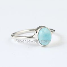 Larimar Ring, Sterling Silver Ring, Natural Larimar Oval Gemstone Ring, Handmade Ring, Silver ring, Larimar Jewelry, Women's Ring, Gift Ring----------------------------------------------------------------------------------------------------------------------------------------------------Metal: Solid 925 Sterling SilverStone Detail :Natural Larimar Size- 7X9  mmShape-Oval CabochonWeight- 2.5Grams Approx ---------------------------------------------------------------------------------------------- Larimar Turquoise Gemstone Ring For Anniversary, Blue Larimar Round Rings, Larimar Turquoise Ring Gemstone Gift, Turquoise Larimar Ring Gift, Oval Turquoise Moonstone Ring, Turquoise Larimar Round Ring, Oval Turquoise Stackable Ring As Gift, Oval Stackable Turquoise Ring Gift, Oval Aquamarine Rings In Turquoise Color