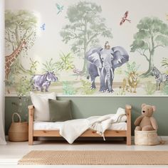 an elephant and giraffe mural in a child's room