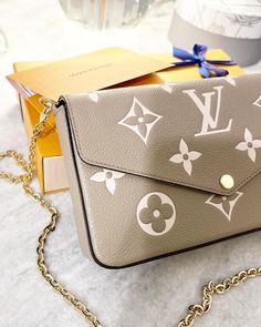 Condition: New - 8.3 x 4.7 x 1.2 inches (length x Height x Width)- Tourterelle Gray/Cream- Monogram Empreinte embossed supple grained cowhide leather- Textile lining- Gold-color hardware- Press-stud closure- Large compartment- Inside flat pocket- Chain:Removable- Chain drop: 20.9 inches- Made in Italy - Retail: $1760 plus tax- No inserts- Comes with: original box, dust bag and receipt Shipping: All orders will be shipped the following business day Felicie Pochette, Louis Vuitton Felicie Pochette, Louis Vuitton Felicie, Balenciaga Backpack, Louis Vuitton Purse, Lv Handbags, Bags Designer Fashion, Lv Bag, Burberry Bag