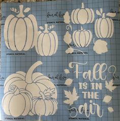 a cutting mat with pumpkins and leaves on it, including the words face is in the avocado