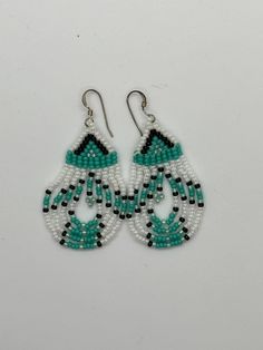 "Handmade beaded drop earrings. Measure 2.5\" long including hook and just over an inch wide. Turquoise, black and white Miyuki glass beads used.  Please feel free to contact me with any questions." Turquoise Bead Earrings, Klamath Falls, Beaded Earrings Tutorials, Earrings Turquoise, Earrings Beaded, Beaded Drop Earrings, Earring Tutorial, Beaded Bracelets Diy, Brick Stitch