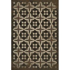 a rug with an intricate design on the side and dark brown border, in front of a