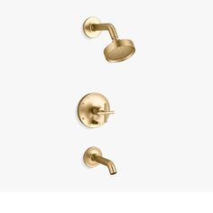 the shower faucet is shown in polished brass