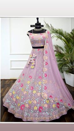 Contact us for any queries about product or shop and real images. Lehenga : Faux Georgette Fabric With Sequence Embroidery Thread Work Inner : American crept in lehenga choli : Faux Georgette Fabric With Sequence Embroidery Thread Work (unstitch) Duppta : Faux Georgette Fabric with Sequence Embroidery Lace Border ( 2.25 Metre) Size : Semi stitched Work : Sequence Embroidery Thread Work Care : Dry Clean Type : Party Wear Lehenga Choli, Engagement Lehenga choli, Wedding Lehenga Choli Latest Trendy Lehenga Designs, Women Indian Outfits, Blue Floral Dress Outfit, Indian Outfits For Women, Trendy Lehenga Designs, Lavender Lehenga, Trendy Lehenga, Embroidery Lace Border, Bday Dress