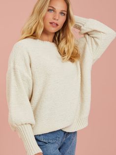 This sThis sweater is the epitome of cozy, designed to wrap you in comfort while keeping you effortlessly stylish. Its plush texture creates a warm and inviting feel, making it perfect for snuggling up on chilly days or lounging around in comfort. Cozy Relaxed Fit Sweater For Cold Weather, Cozy Sweater For Loungewear, Comfy Chunky Knit Sweater With Cozy Fit, Comfy Cozy Fit Chunky Knit Sweater, Comfortable Cozy Sweater For Cold Weather, Cozy Long Sleeve Sweater For Loungewear, Comfortable Cozy Fit Sweater For Cold Weather, Cozy Sweater With Soft Texture For Lounging, Super Soft Winter Sweater For Loungewear