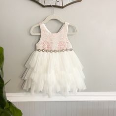 Brand New With Tags American Princess Girls Size 24 Month Textured Bodice With Metallic Thread, Pink White Gold Floral Design Layered Tulle Skirt Jeweled Detachable Belt, White And Gold Comes With Bloomer Cover. White Tutu Dress With Lace Trim For Parties, White Lace Princess Dress For Summer, White Lace Tutu Dress For Spring, White Tiered Tutu Dress For Spring, Princess White Tutu Dress For Spring, White Princess Tutu Dress For Spring, Cute Fitted White Princess Dress, White Fitted Cute Princess Dress, Spring White Princess Dress With Lace Trim