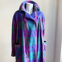 "This vintage coat by Hilary Radley is a unique piece that is sure to turn heads. The lavender pink plaid pattern is eye-catching and the boxy fit adds a modern twist to the classic design. The wool blend material is warm and comfortable, making it perfect for the cooler seasons. The coat features patch pockets for added convenience and style. It is a size 8 and suitable for regular  or plus size types. This parka style coat is perfect for any occasion and will add a touch of sophistication to a Blazer And Skirt Set, Parka Style, A Line Maxi Dress, Silk Headscarf, Floral Silk Scarf, Colorful Scarf, Pink Plaid, Long Puff Sleeves, Vintage Coat