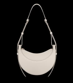 With its rounded shape, foam padding, and hand-stitching, the “Numéro Dix” is a nod to the equestrian codes of saddlery. Its half-moon design highlights juxtaposing curves. Chalk Texture, Body Craft, Cream Bags, Girly Accessories, Fashion People, French Brands, Friends Fashion, Moon Design, The Chic