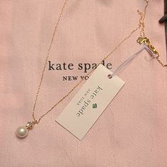 Beautiful Kate Spade Necklace Featuring Faux Pearl And Cz Pendant On A Delicate Gold Colored Chain. Chain Is 17 Inches With A 3 Inch Extender Kate Spade Pearl Necklace, Elegant Kate Spade Necklace With Adjustable Chain, Elegant Kate Spade Jewelry With Adjustable Chain, Kate Spade Necklaces For Wedding, Kate Spade Feminine Wedding Jewelry, Feminine Kate Spade Jewelry For Wedding, Feminine Kate Spade Wedding Jewelry, Chic Kate Spade Wedding Jewelry, Elegant Kate Spade Necklaces For Formal Occasions