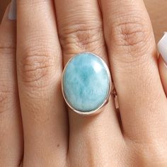 "Larimar Ring / 925 Sterling Silver Ring / Oval Gemstone Ring / Handmade Silver Jewelry /Cabochon Ring / Boho Ring / Ring For Women  Gemstone Name - : Larimar Stone Quality - AAA Ring Wight - 7.93 gm  Ring Length - 2.2 cm   Ring Width - 1.7 cm  Stone Shape - As shown in the picture Ring Size - All Ring Size Available You'll get the exact product as shown in the pictures We serve complete 925 sterling silver Jewelry and genuine properties of the stone. The products are dispatched from the small business from USA. Product Quality and Packaging - Our all products are 925 Silver Stamped which shows that the product is genuine and authentic .The products are dispatched from the small business from USA so you get the product on time and the product packaging comes in bubble foil wrap with all th Oval Larimar Gemstone Rings, Oval Larimar Rings For Anniversary, Oval Larimar Cabochon Rings, Picture Ring, Larimar Ring, Larimar Rings, Handmade Silver Jewelry, Larimar Stone, Anniversary Gift For Wife