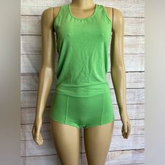 This Skimpies Women's Pajama Set In Green Is Perfect For Any Season. The Sleeveless Top Is Made Of Soft And Comfortable Rayon Material, And The Set Comes In A Size L. The Solid Pattern And Classic Theme Make It A Timeless Addition To Your Sleepwear Collection. Hand Wash Only To Keep The Garment Care Simple And Effective. This Pajama Set Is Perfect For Winter, Summer, Fall, And Spring. Made In The Usa, This High-Quality Sleepwear Is A Must-Have For Any Woman's Wardrobe. Green Stretch Cotton Sleepwear, Green Stretch Summer Sleepwear, Sporty Stretch Summer Sleepwear, Green Fitted Tank Top For Loungewear, Fitted Green Tank Top For Loungewear, Womens Pyjama Sets, Classic Theme, Women's Wardrobe, Pj Sets