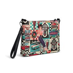 Take a trip down memory lane with our Retro Diner Pin-Up Crossbody Bag. This vintage 50s Rock n’ Roll Jukebox design is the perfect accessory for any classic American diner lover. With its retro style and practicality, it's a must-have for your wardrobe. Crafted from premium faux leather with sleek dark gray hardware, this crossbody bag ensures your essentials stay secure and organized with its zip-top closure and multiple interior pockets. Easily switch between day-to-night looks using the removable wrist and shoulder straps for versatile styling.• Outer fabric: faux leather • Lining: 100% polyester• 11″ × 8″ × 1.5″ (27.9 cm × 20.3 cm × 3.8 cm)• Dark gray hardware• Zip-top closure• Inside zip and slip pockets• Adjustable, removable wrist and shoulder straps• Strap drop length: 14″- 27″Thi 50s Rock N Roll, Classic American Diner, 50s Rock And Roll, Retro Diner, American Diner, Bag Vintage, Classic American, Night Looks, Memory Lane