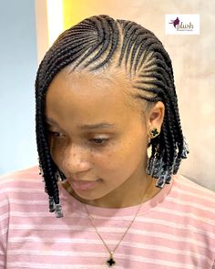 This short bob cornrows hairstyle with beads is perfect for those who love a sleek, modern look with a touch of tradition. The cornrows are styled into a short bob, ending with clear beads that add a playful and chic element to the hairstyle.

Photo credit by: plush_naturalhairtz Bob Cornrows, Braids With Wooden Beads, Half Box Braids, Half Cornrows Half Box Braids, Stitch Cornrows, Box Braids Styles, Side Swept Braid