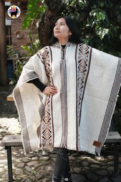 HANDMADE WOOL PONCHOS Ecuadorian artisans handcraft these ponchos in the Andes with unique techniques and designs. These luxurious wool ponchos are not only beautiful, and unique but they will keep you very warm during winter and fall with style. These ponchos are closed in the front and can be used by women and men. ITEM DESCRIPTION These ponchos are 100% wool.  Measurements are as follows: 43 inches in width and 35 inches in length (including the fringes). They are One size fits most. MATERIAL 100% Sheep Wool  WASHING INSTRUCTION *Hand wash OR machine wash in cold water *Use regular detergent *Do not bleach *Lay flat to dry *DO NOT USE A DRYER PLACING AN ORDER We ship fast and free! Orders are procced the next business day using USPS Priority Mail Service.  *Your support helps provide ou Artisan Handwoven Poncho, One Size, Artisan Poncho For Fall, Traditional Beige Poncho For Winter, Artisan Poncho For Fall One Size, Artisan Handwoven Winter Poncho, Traditional White Poncho For Fall, Handmade Beige Poncho One Size, Handmade Artisan Poncho For Fall, Traditional White Poncho One Size